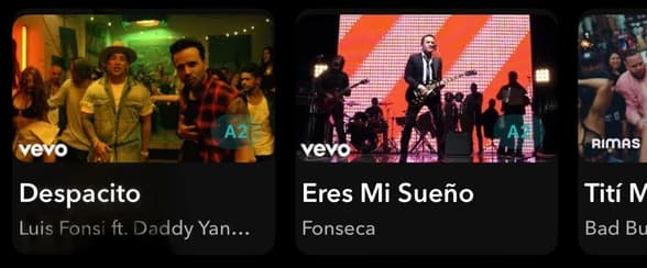 Row of song cards including Despacito and Eres Mi Sueño